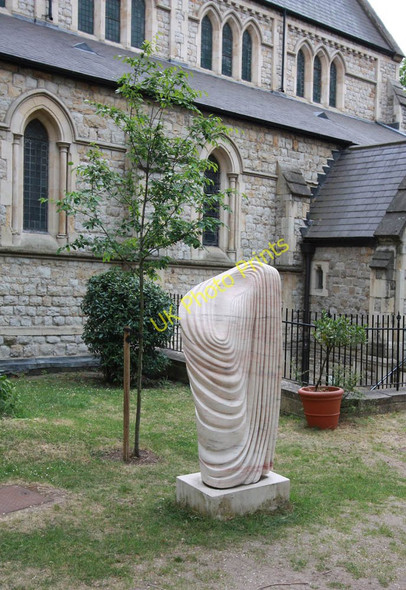 Photo 6"x4" St John the Evangelist, Lansdowne Crescent - Sculpture in churchyard Kensington\/TQ2579 c2011