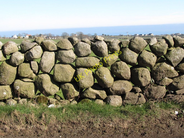 Photo 6"x4" A single boulder based stone wall on Ballyveaghmore Road Ballymartin c2011
