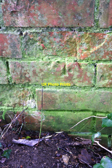 Photo 6"x4" Damaged benchmark on building, Park Road Malmesbury c2011