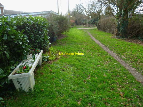 Photo 6"x4" Seat with flowers provided on footpath at Hunston Donnington\/SU8502 c2012