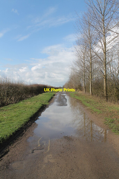 Photo 6"x4" Puddle on Thorpe Lane Aisthorpe c2012