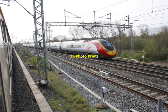 Photo 6"x4" Virgin Pendolino speeds towards Rugby Station Rugby c2012