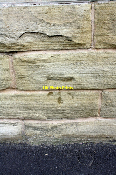 Photo 6"x4" Benchmark on shop at Bradford Street - Brown Street junction Keighley c2012