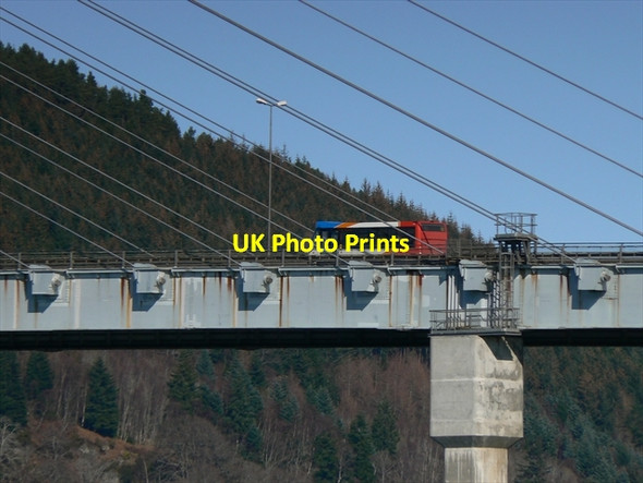 Photo 6"x4" Bus crossing the Kessock Bridge Inverness c2011