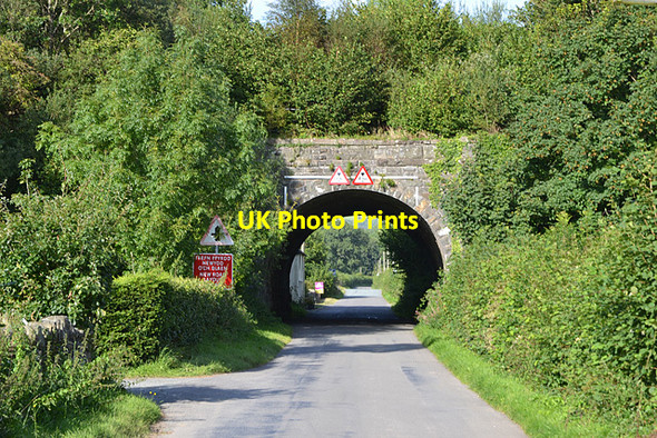Photo 6"x4" Road approaching railway bridge in Llanbrynmair Llanbrynmair c2012