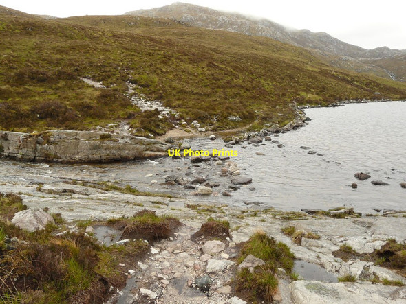 Photo 6"x4" Pipe rock at outfall of Loch Gainmhich Unapool c2009