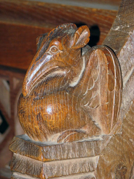 Photo 6"x4" St Benedict's church - carved bench elbow Upper Street\/TG3517 c2007