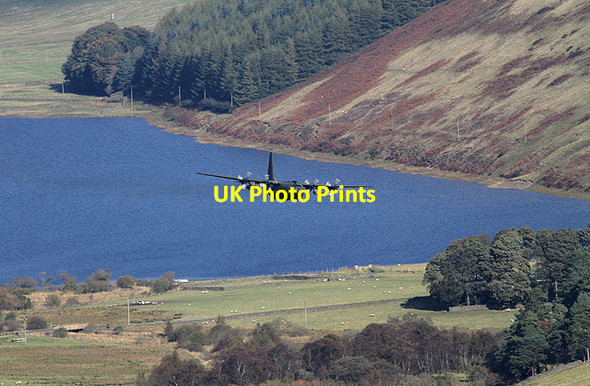 Photo 6"x4" A Hercules flying low over Loch of the Lowes Bowerhope c2012