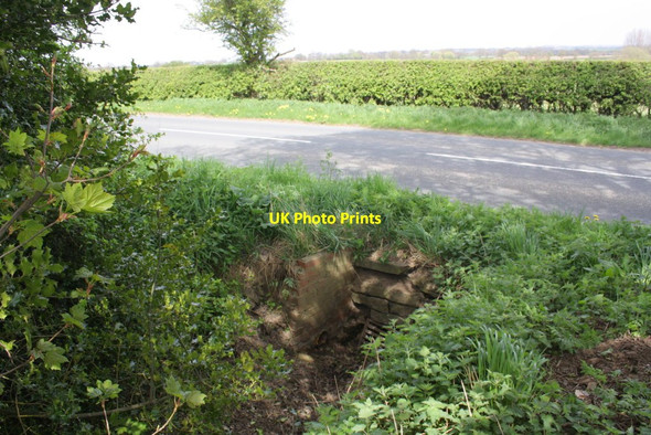 Photo 6"x4" Culvert for drain under road south of Warlaby Newby Wiske c2013