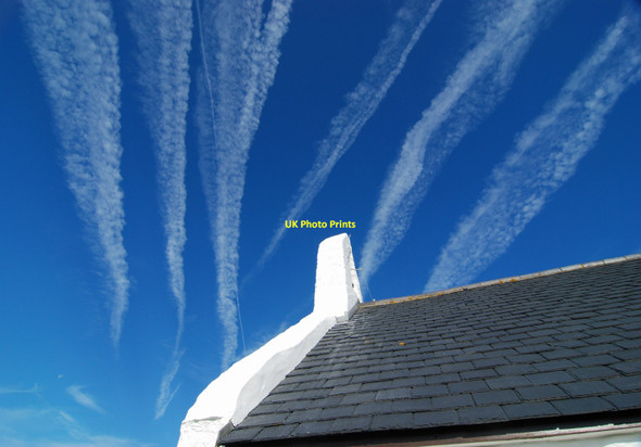 Photo 6"x4" Contrails above the church at Mwnt Y Ferwig c2013