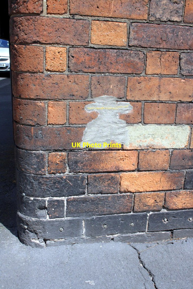 Photo 6"x4" Damaged benchmark on #67 Cross Street Burton upon Trent c2013
