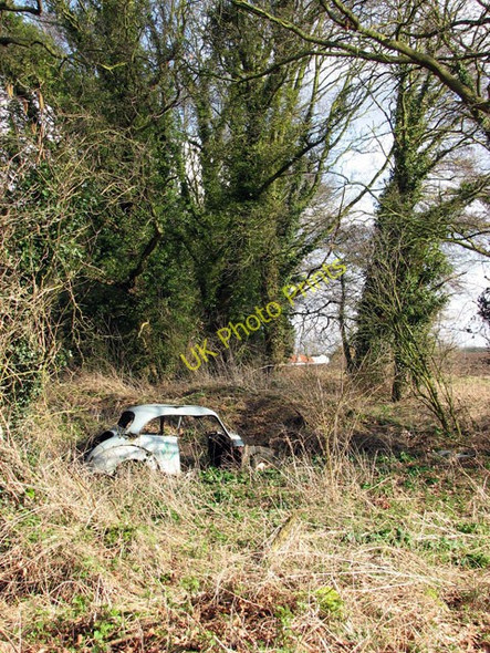 Photo 6"x4" The skeleton of an old car Horsham St Faith c2009