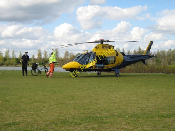 Photo 6"x4" Doctors in helicopters and policemen on bikes Downhead Park c2009