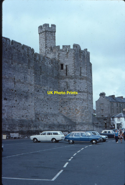Photo 6"x4" Car park under the walls of Caernarfon Castle Caernarfon c1976