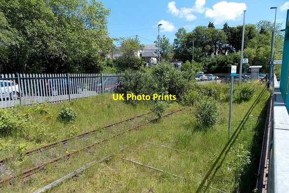 Photo 6"x4" Overgrown track at the edge of Pontyclun railway station Pontyclun c2014