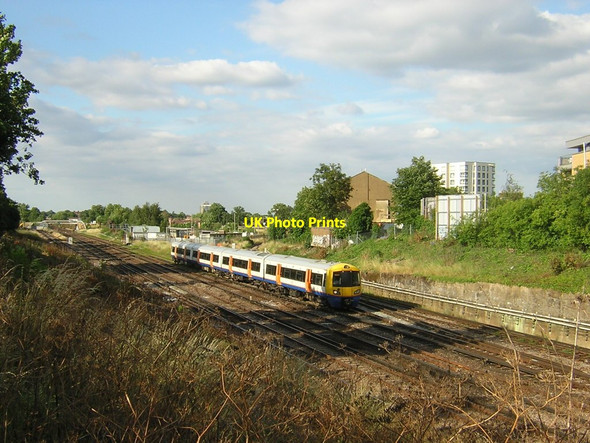 Photo 6"x4" London Overground train passes Bromley Junction, from the Goat House bridge Penge c2014