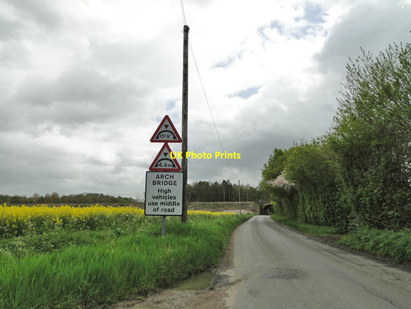 Photo 6"x4" Gislingham Railway arch and warning signs Gislingham c2015