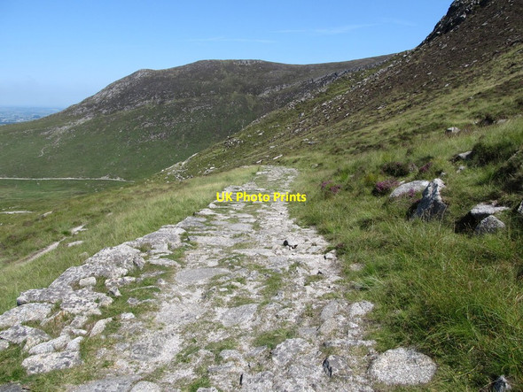 Photo 6"x4" Paved roadway leading from slab workings on the north slopes of Slieve Bearnagh Kilcoo c2014