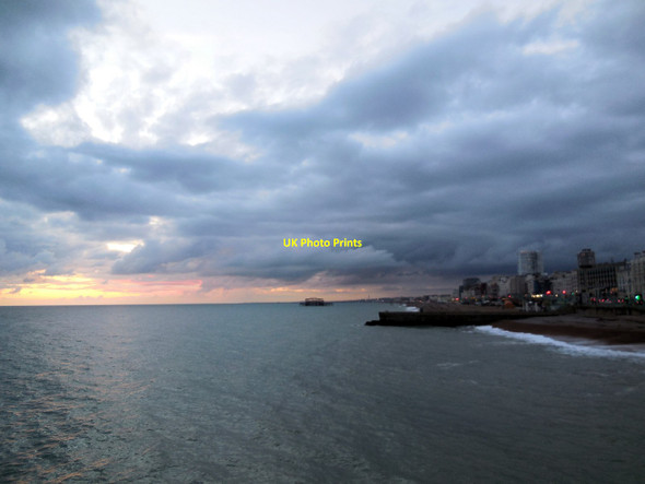 Photo 6"x4" View from Brighton Pier at sunset Kemp Town c2014