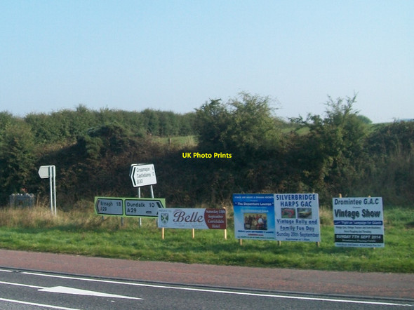Photo 6"x4" Adverts at the B30\/A29 cross roads near Silverbridge Creggan\/H9316 c2014