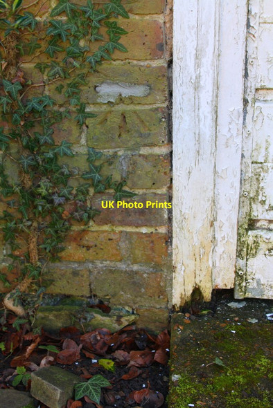 Photo 6"x4" Benchmark on 'Russet Lodge' garage Woking c2015