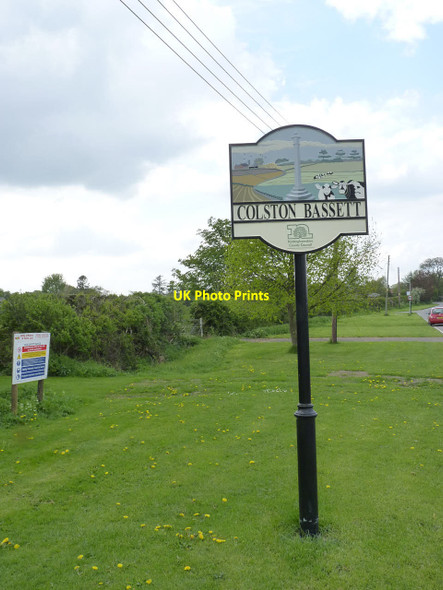 Photo 6"x4" Colston Bassett village entrance sign Colston Bassett c2014