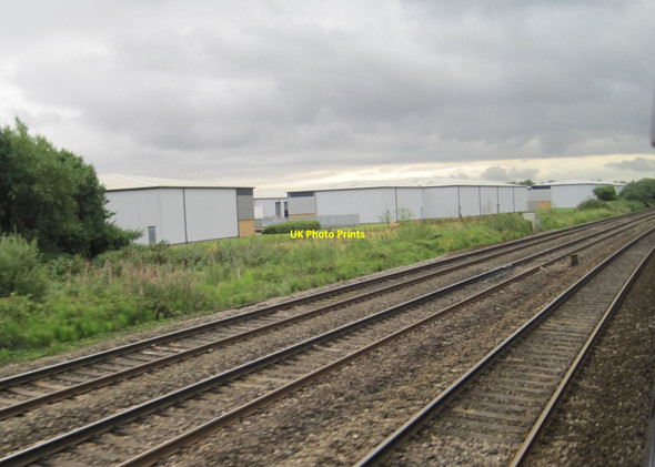Photo 6"x4" View from a Bristol-Cardiff train - Industrial units on Cardiff outskirts Llanrumney c2015