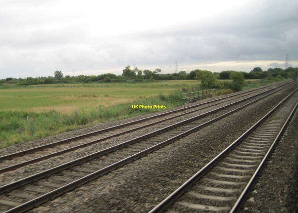 Photo 6"x4" View from a Bristol-Cardiff train - agricultural flatlands near St Mellons Peterstone Wentlooge c2015