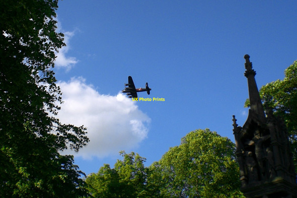 Photo 6"x4" Lancaster bomber over Grantham Grantham c2009