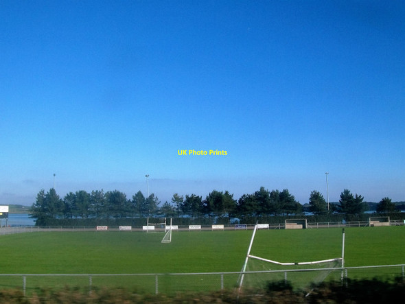 Photo 6"x4" Dundrum GAA pitch viewed from Dundrum Road Dundrum\/J4036 c2015