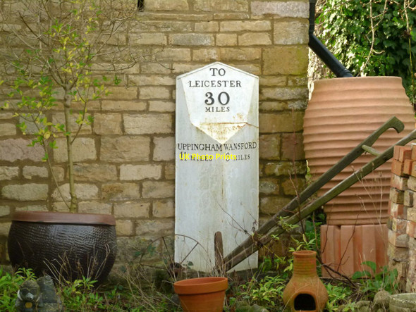 Photo 6"x4" Old milepost in a Wansford garden Stibbington c2015