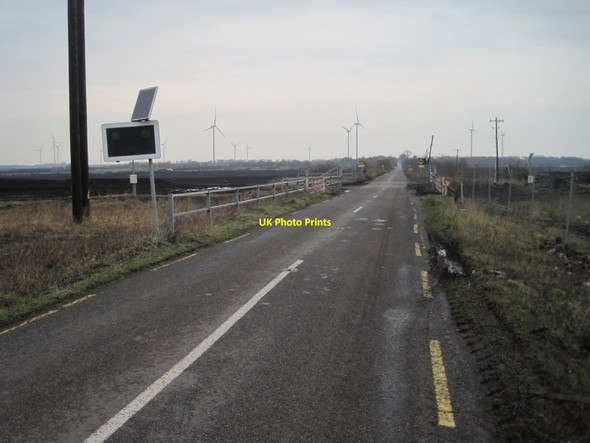 Photo 6"x4" Narrow gauge bog railway crossing R502 near Derrygreenagh Moyne\/S1964 c2016