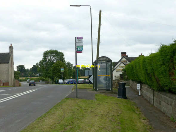 Photo 6"x4" Morley Smithy, bus stop, milepost and pub Morley Smithy c2017