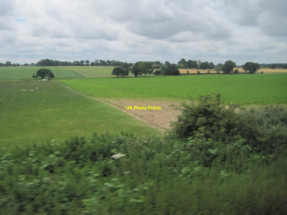 Photo 6"x4" View from a Norwich-Great Yarmouth train - fields near Burlingham Lingwood c2016