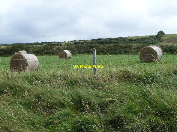 Photo 6"x4" Hay bales awaiting collection, near Devil's Elbow Ballacarnane Beg c2016