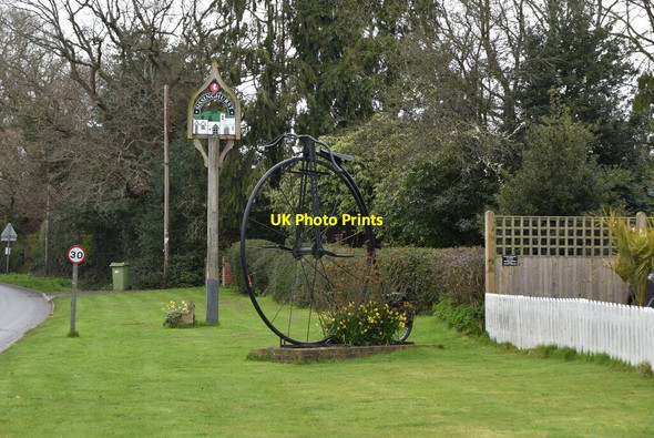 Photo 6"x4" Penny Farthing and village sign Sissinghurst c2020