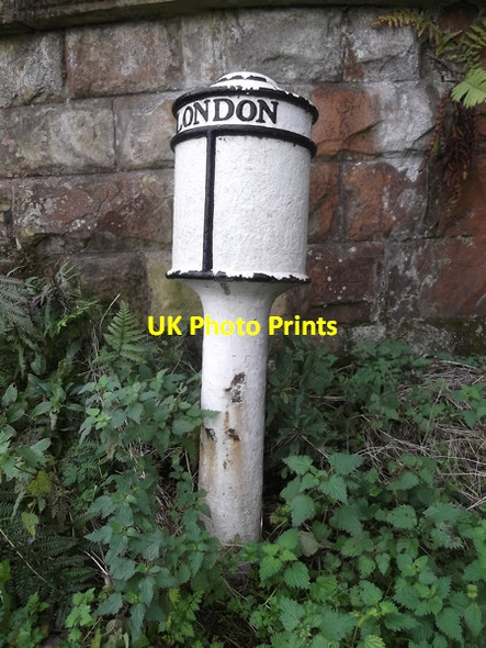 Photo 6"x4" Old Milepost by the A6020, Ashford Road, Rowland Bakewell c2014