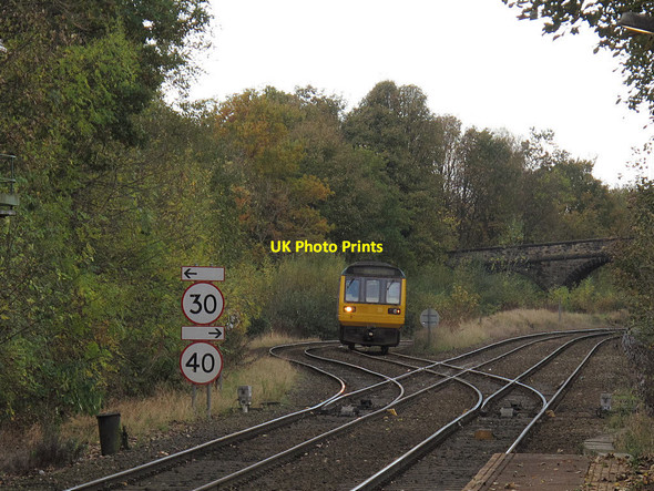 Photo 6"x4" Romiley railway station - Sheffield service approaching Romiley c2016