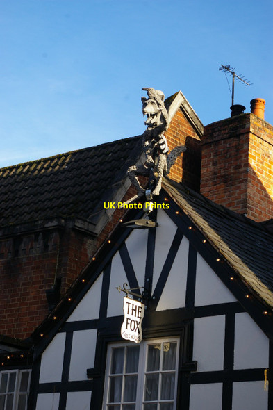 Photo 6"x4" Oswestry: decoration on the gable of the Fox pub, Church Street Oswestry\/Croeswallt c2019
