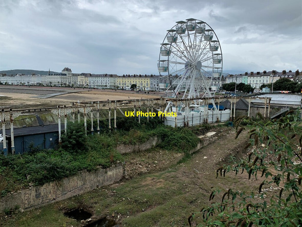 Photo 6"x4" Ferris wheel with backdrop of Llandudno promenade Llandudno c2021