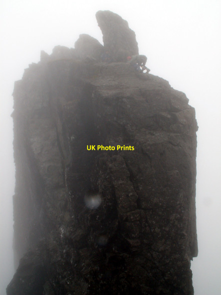 Photo 6"x4" A climber reaching the top of the In Pin Sg\u00f9rr Dearg\/NG4421 c2010