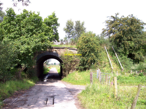 Photo 6"x4" Farm track passes under  railway bridge at Hall's Folly Barrow Nook c2010