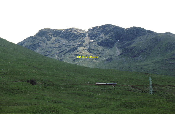 Photo 6"x4" Glasgow to Fort William train and electricity pylon Achallader c1993