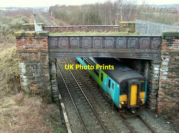 Photo 6"x4" Train passing under disused bridge Harraby c2008