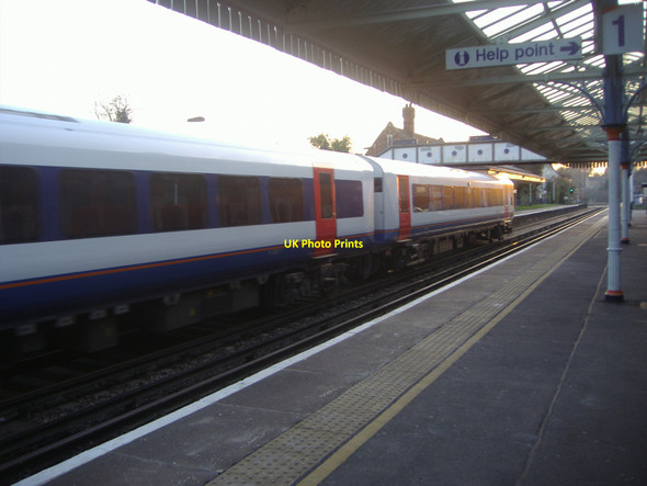 Photo 6"x4" Train passing through Farncombe station Godalming c2008