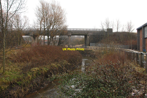 Photo 6"x4" River Douglas passing under railway Wigan c2011