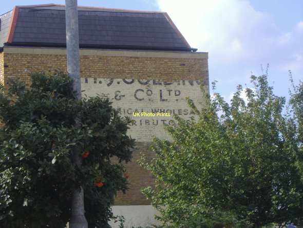 Photo 6"x4" Remains of painted advertisement, Plough Road Battersea c2009