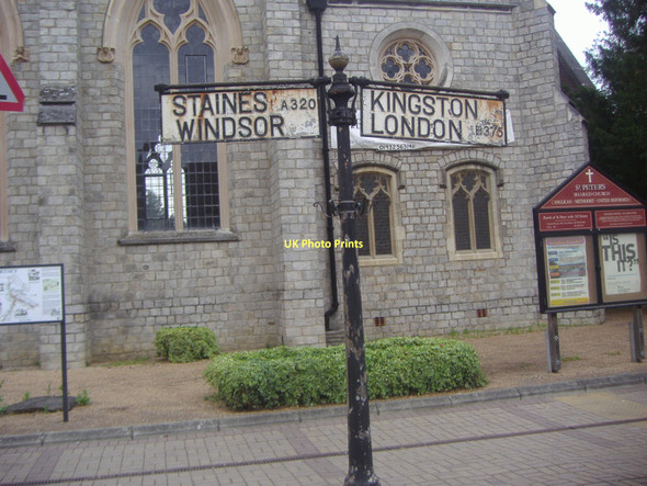 Photo 6"x4" Old fingerposts in front of the church, Chertsey Chertsey c2009