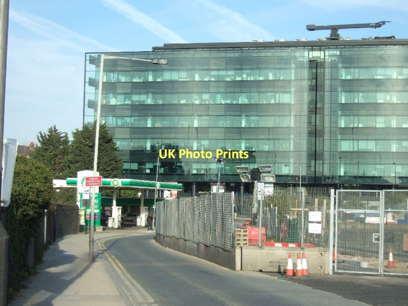 Photo 6"x4" Office block, filling station and building site London c2011