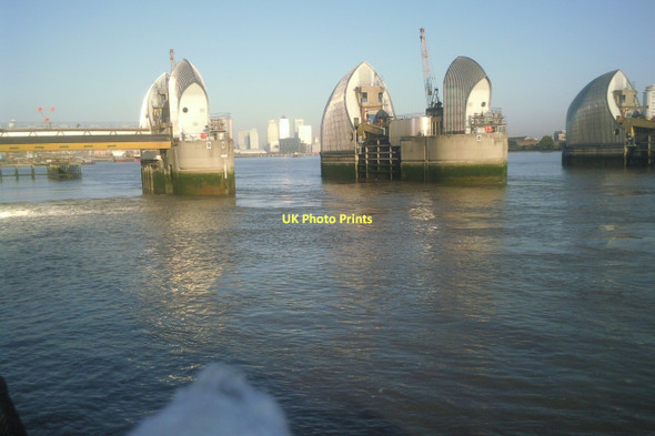 Photo 6"x4" Canary Wharf seen through the Thames Barrier Woolwich c2011